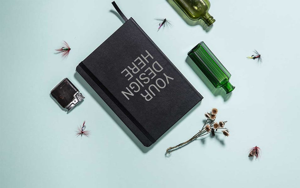 Book With Flower On Desk