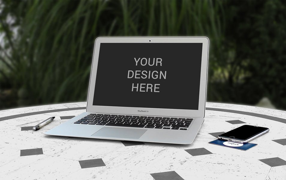 Macbook air on table Mockup