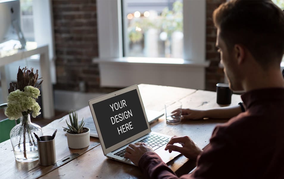Man Using Macbook Mockup