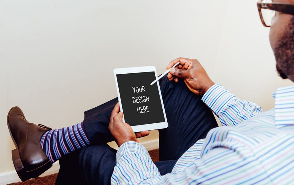 Man Using iPad Air Mockup