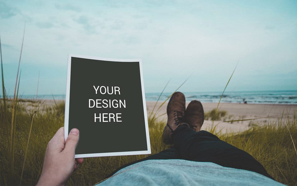 Brochure in hand Mockup